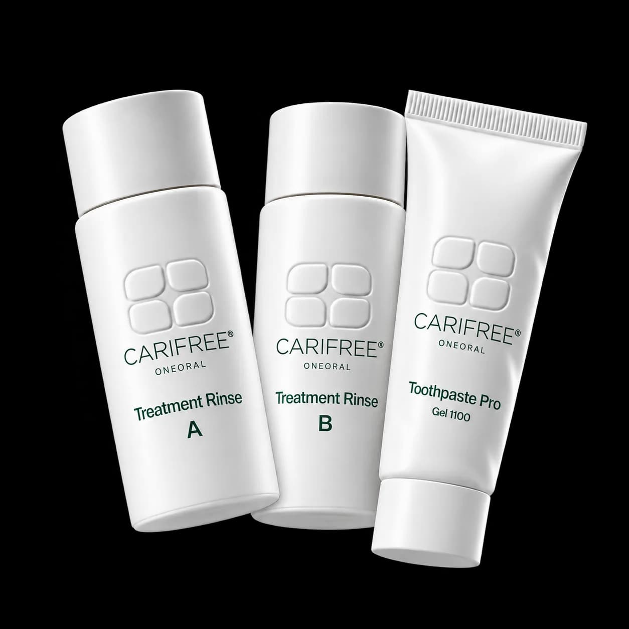 CariFree ONEORAL Treatment Rinse A and B bottles beside a Toothpaste Pro Gel 1100 tube