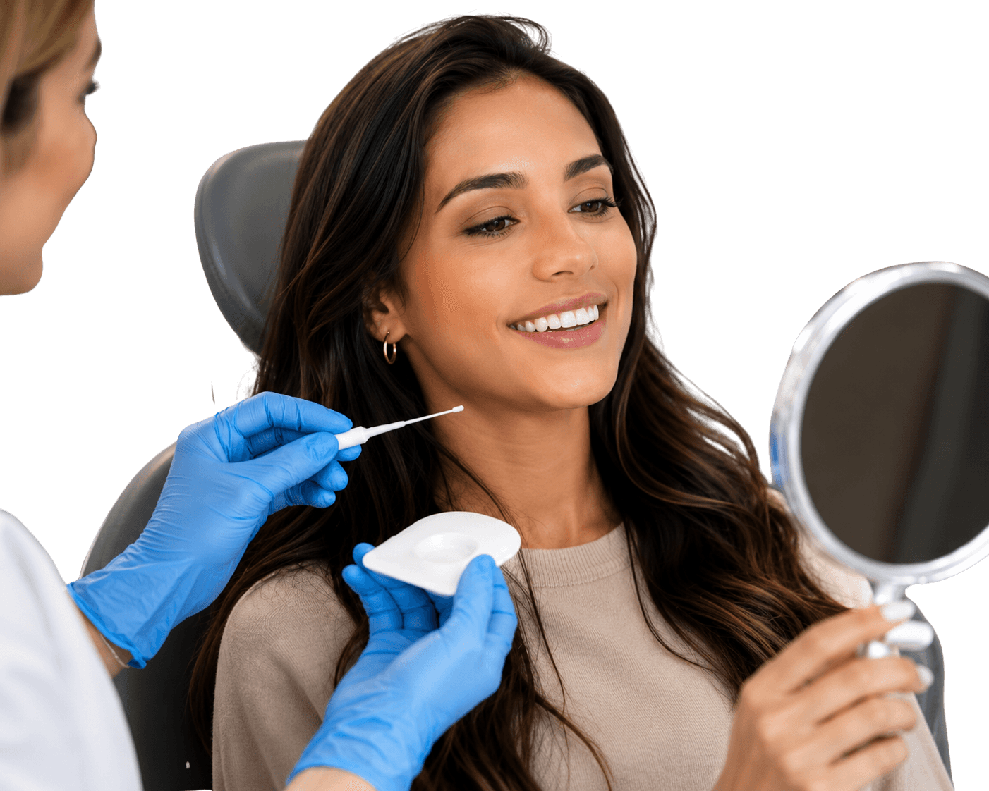 A dentist applying Curodont Repair gel to a patient’s tooth