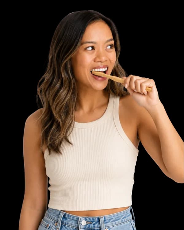 A woman brushing her teeth