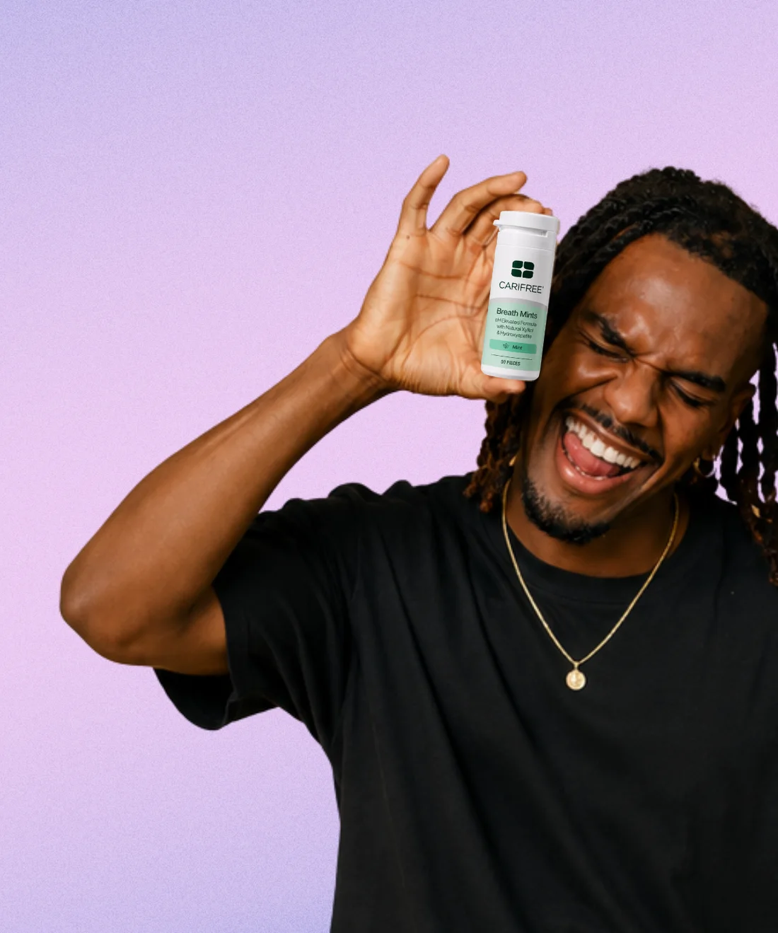 A OneOral member holding a tin of xylitol breath mints
